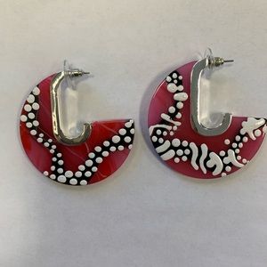 One of a kind hand painted pink resin earrings.